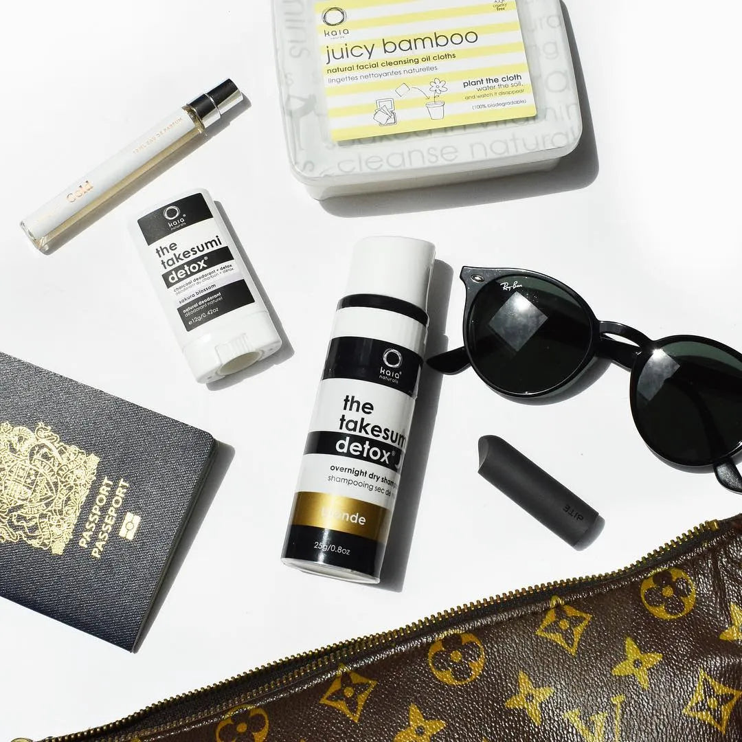 Kaia dry shampoo with LV purse and sunglasses