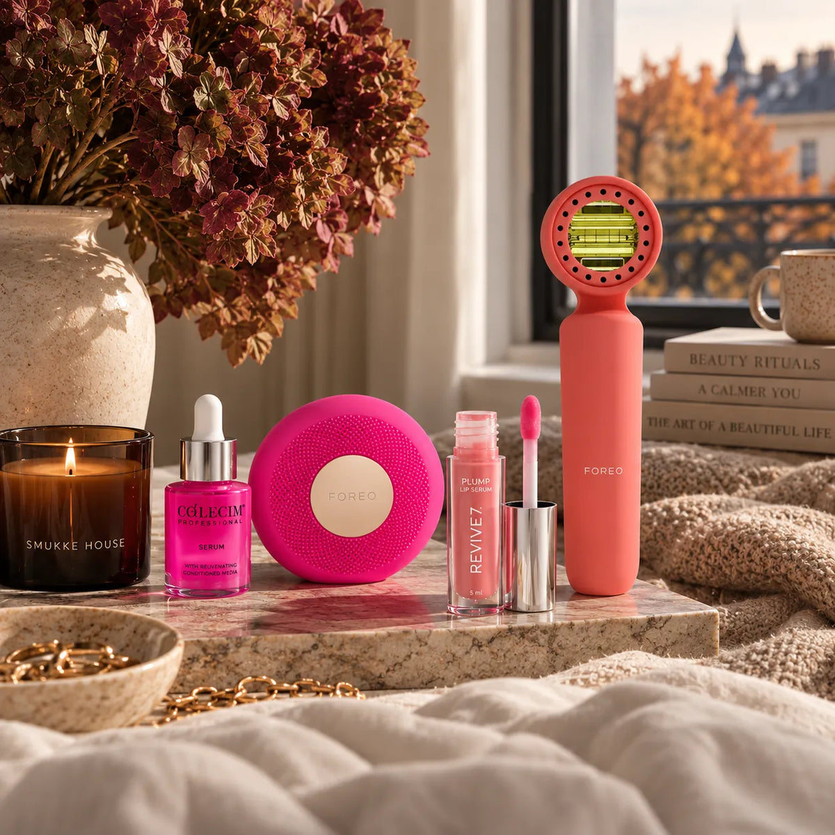 FOREO devices and skincare by window sill