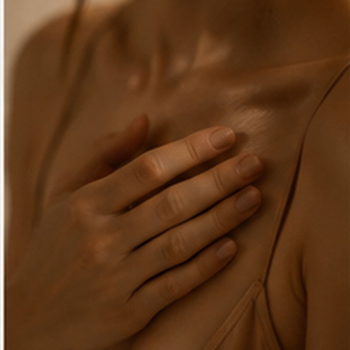 close up of hand on heart