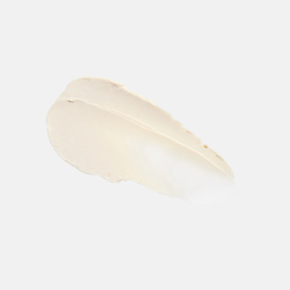 Beige makeup swatch on a light gray background