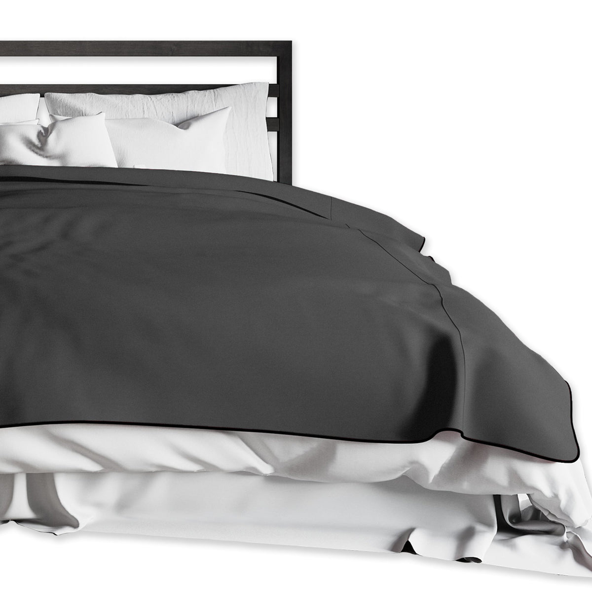 close up of blanket on corner of bed