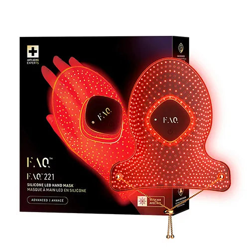 A pair of red silicone LED hand masks with gold-toned metal accents and a small hanging charm, displayed in front of their black retail box. The packaging features a graphic of the mask glowing red.