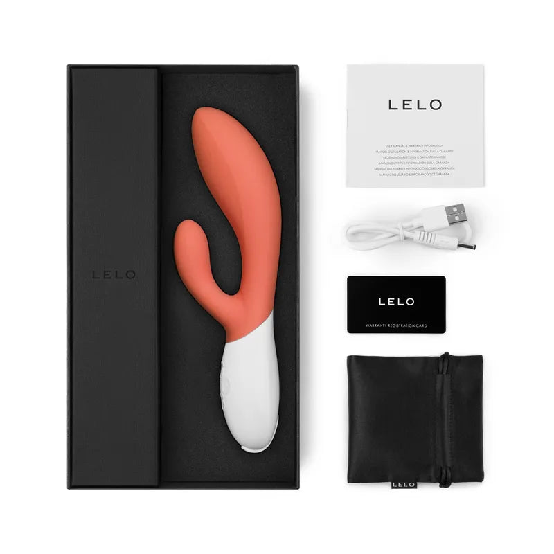 LELO product with packaging, USB cable, and user manual on a white background