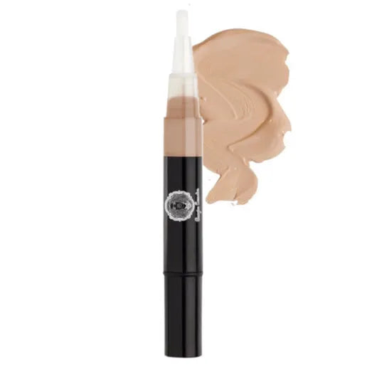 Makeup concealer stick with applicator on a white background