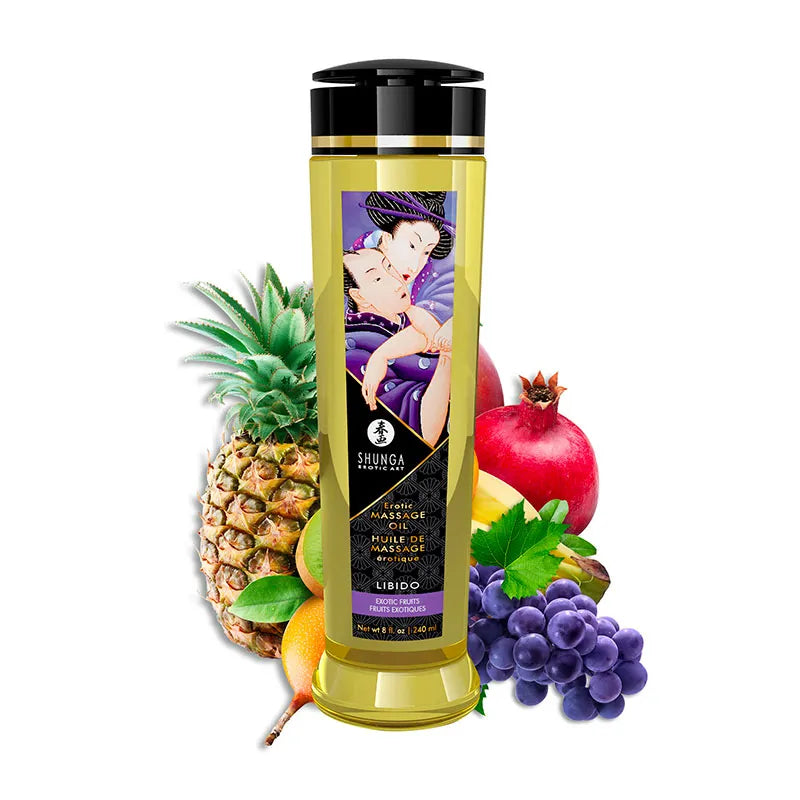 Shunga Libido fruit-infused massage oil bottle with pineapple, pomegranate, and grapes on a white background
