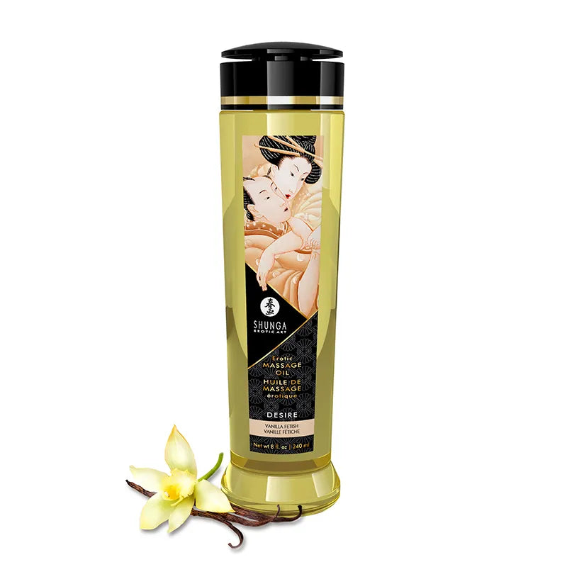 Shunga massage oil bottle with vanilla flower and vanilla bean on a white background
