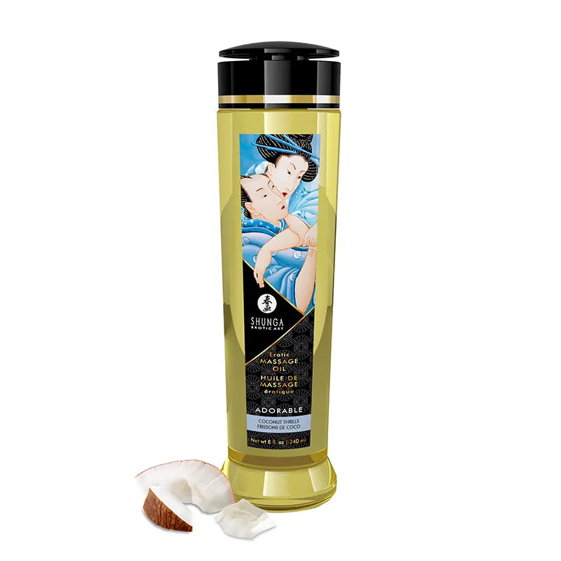 Shunga Adorable massage oil bottle with a coconut on a white background