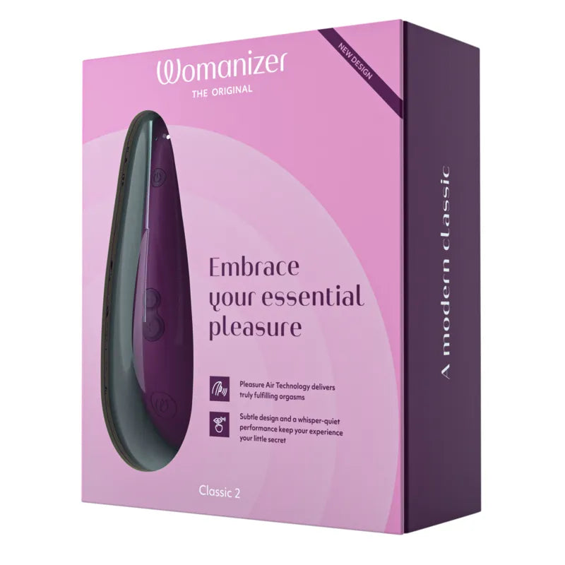 Purple packaging of a womanizer product with text on a white background