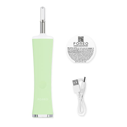 Green device with USB cable and user manual on a white background