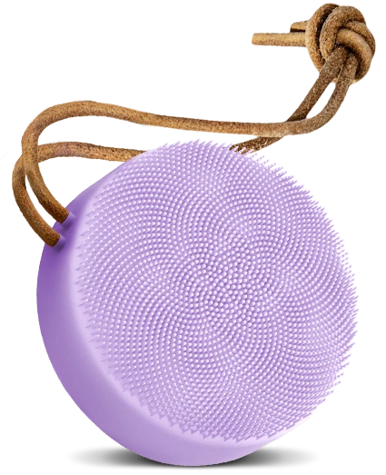 Purple silicone brush with brown string on a white background