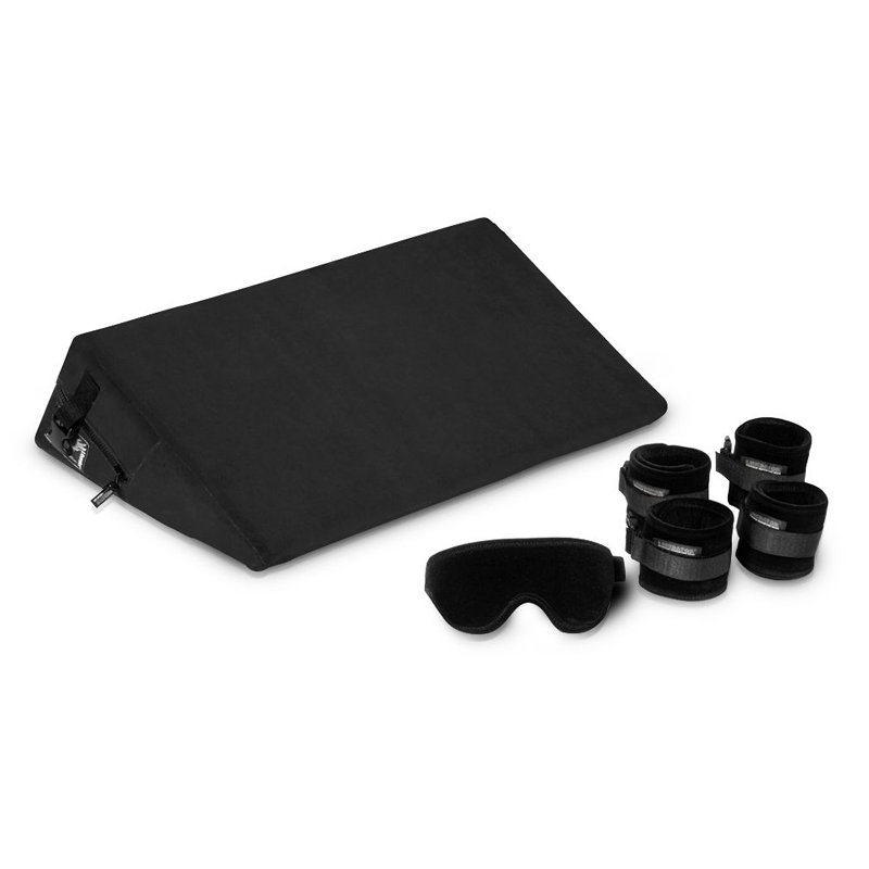 black ramp with blindfold and cuffs beside it