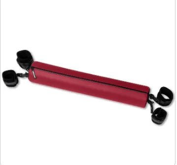 A red cylindrical padded strap or support with black adjustable loops and straps attached at both ends, shown on a plain white background.