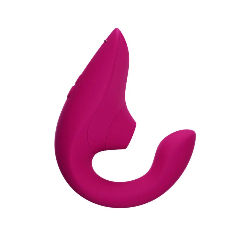 Pink silicone massager on a white background