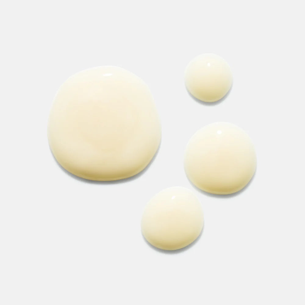 Four beige circular drops on a light gray background