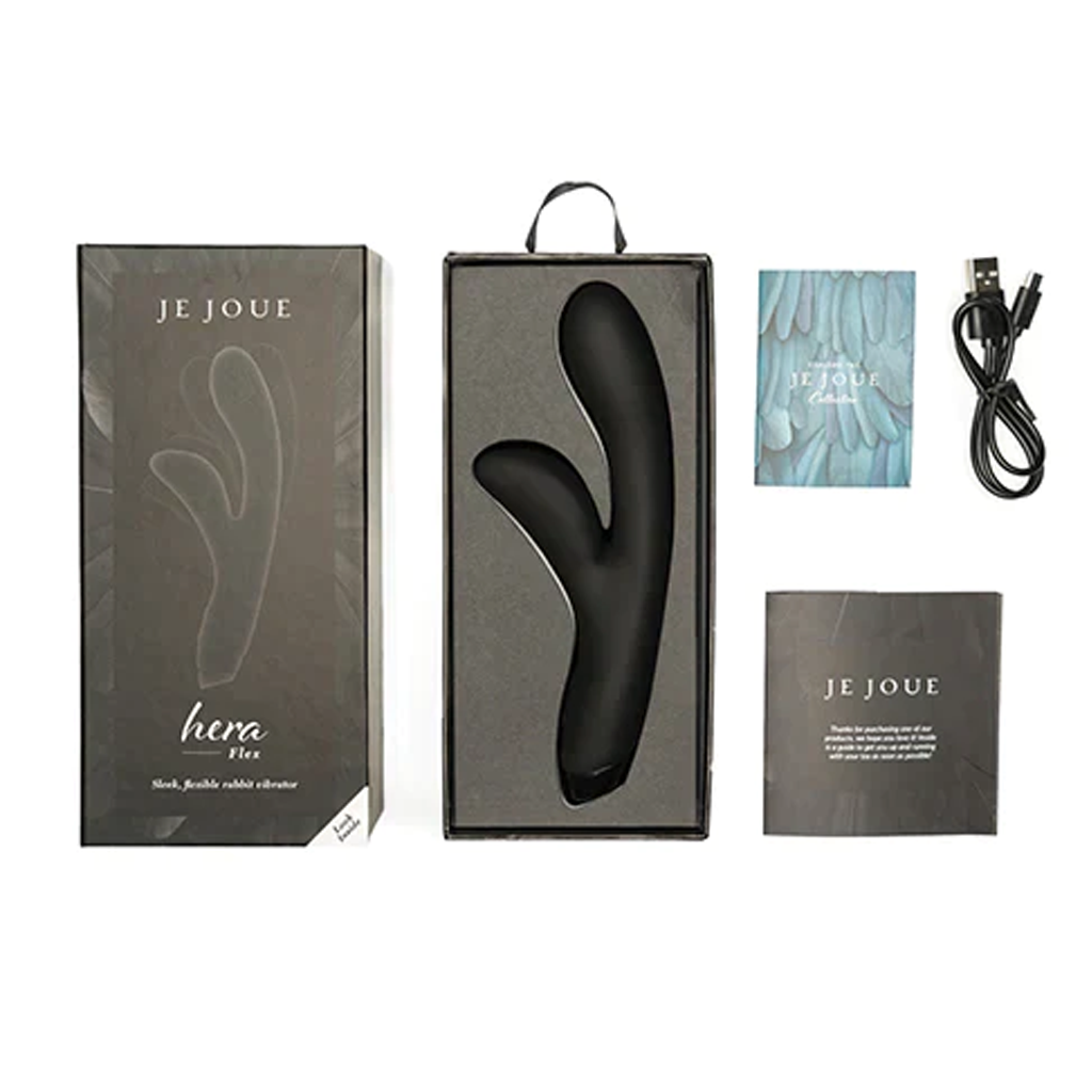 Black G-shaped device in packaging with JE JOUE branding, USB cable, and user manual on a white background.