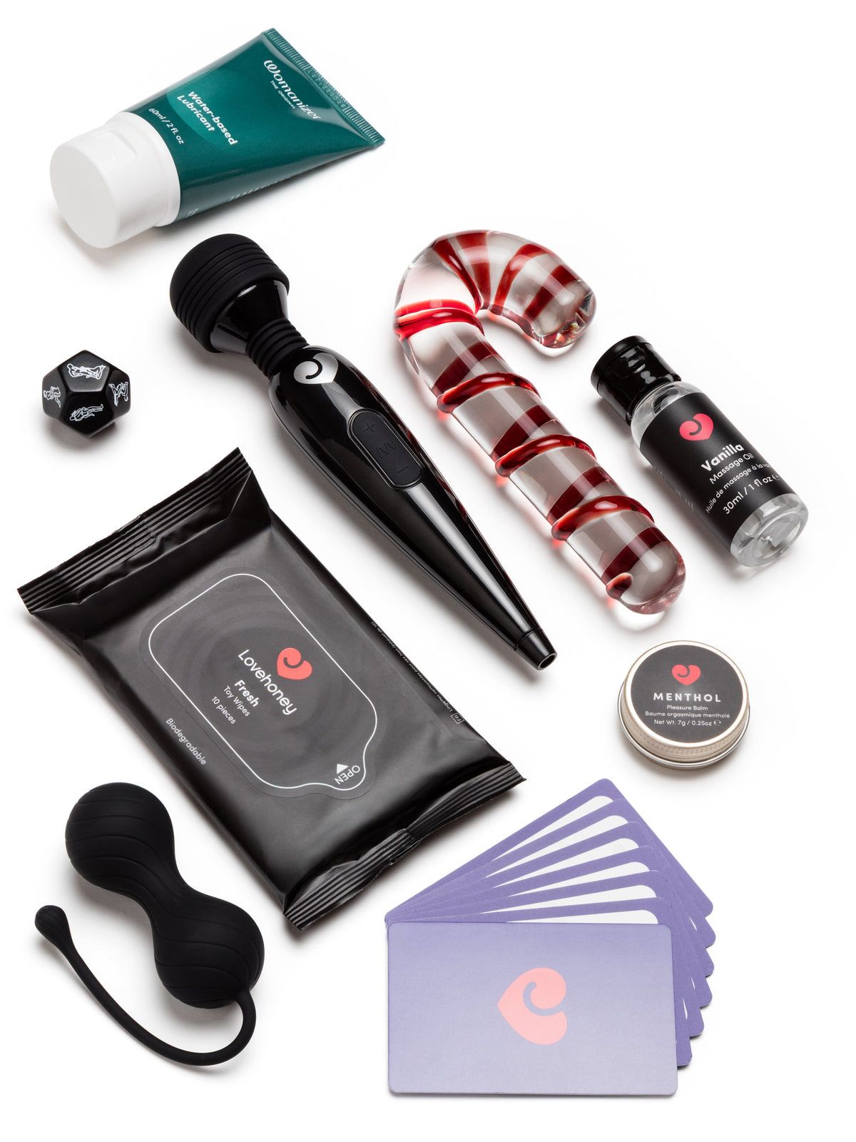 mix of cards adn sex toys on white background