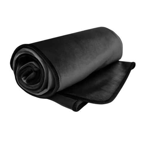 Rolled-up black blanket on a white background
