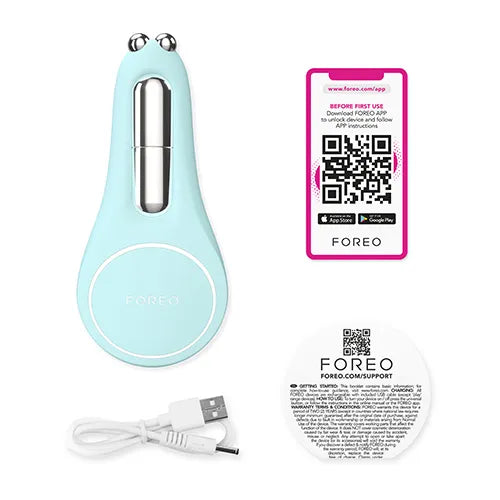 Foreo device with USB cable and QR code labels on a white background