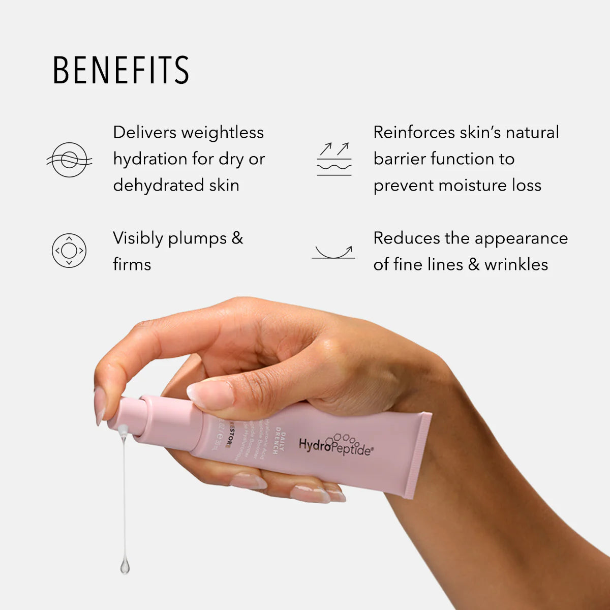 Hand holding a pink skincare product with text listing benefits on a white background