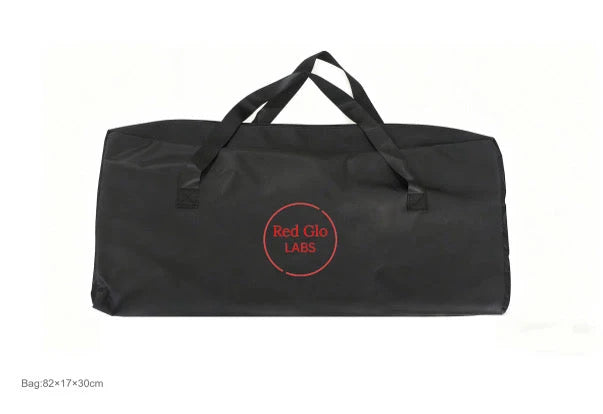 Red Glo Labs duffle bag, suggesting mat folds up into it
