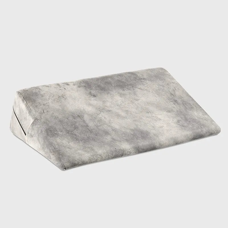 Gray wedge pillow on a white background