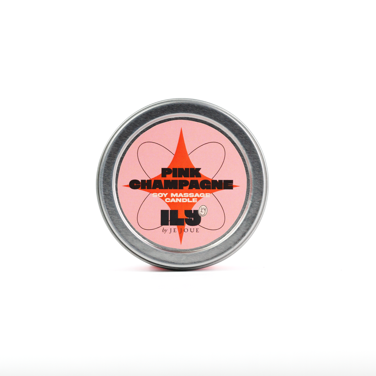 A round metal tin of ILY Paris 'Pink Champagne' soy massage candle, featuring a pink label with a red starburst and black text, set against a plain white background.