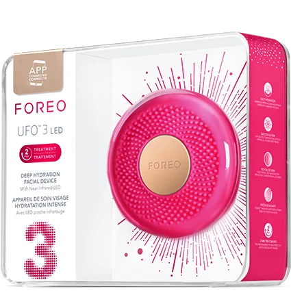 FOREEO UFO 3 LED deep hydration facial device in its retail packaging, featuring a bright pink circular device with a beige central button, shown inside a white and pink box.