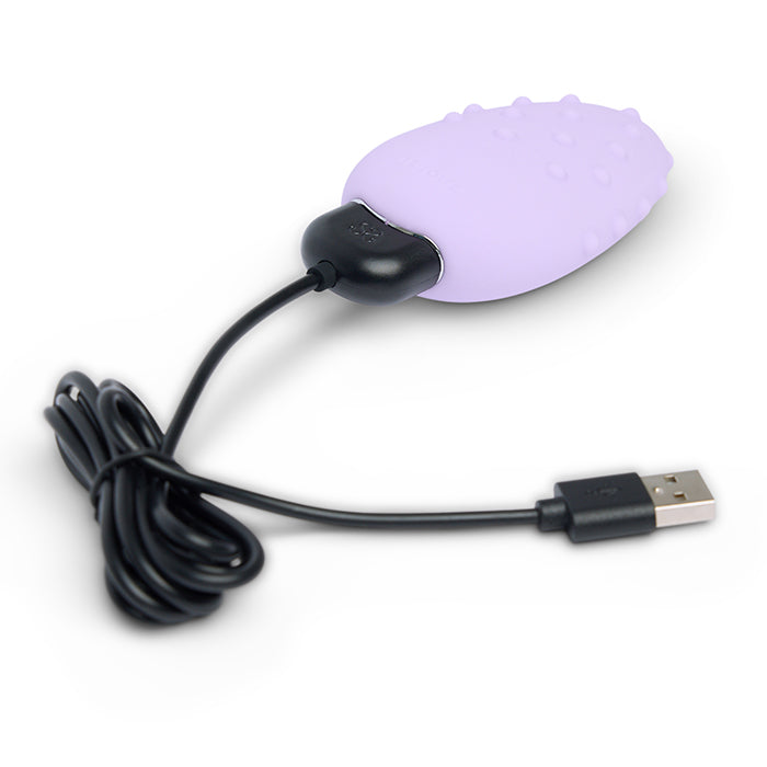 Purple USB device with a black cable on a white background