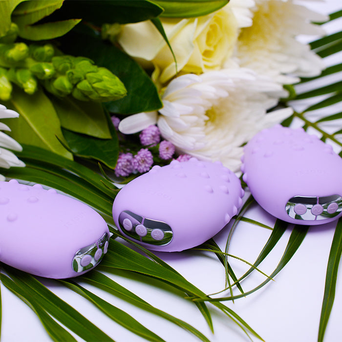 Purple electronic devices with floral and green leaf background
