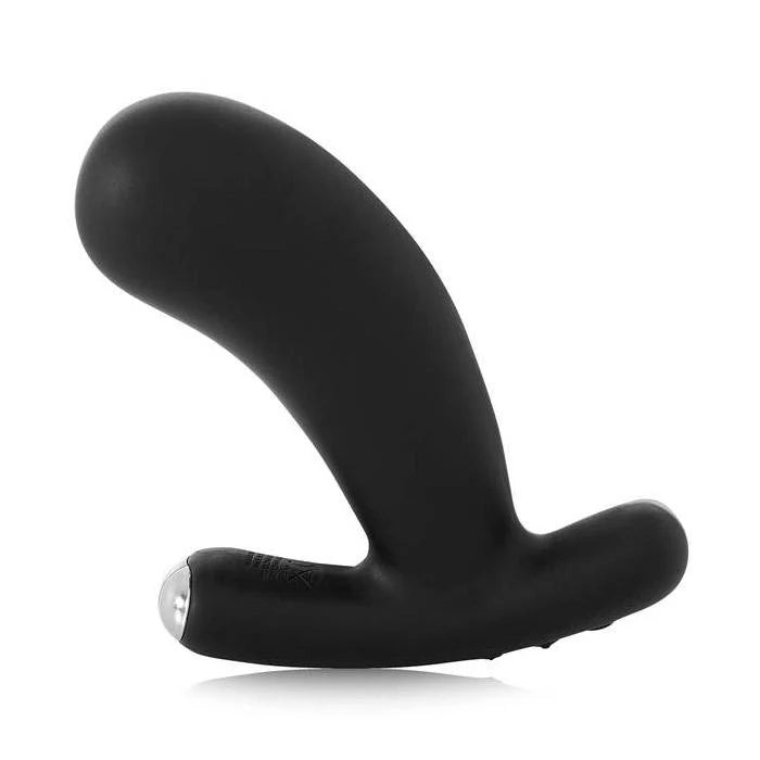 Black silicone butt plug on a white background