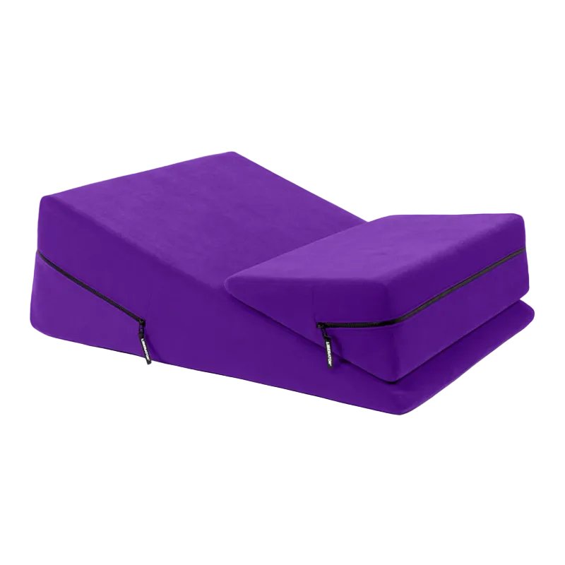 Purple wedge pillow on a white background