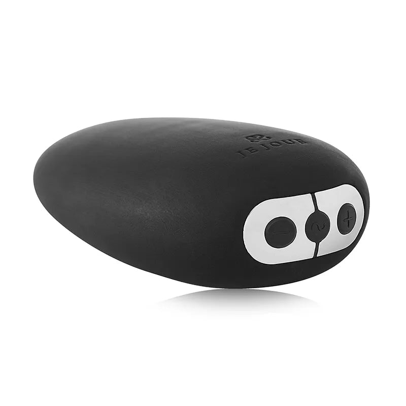 Black electronic device with control buttons on a white background