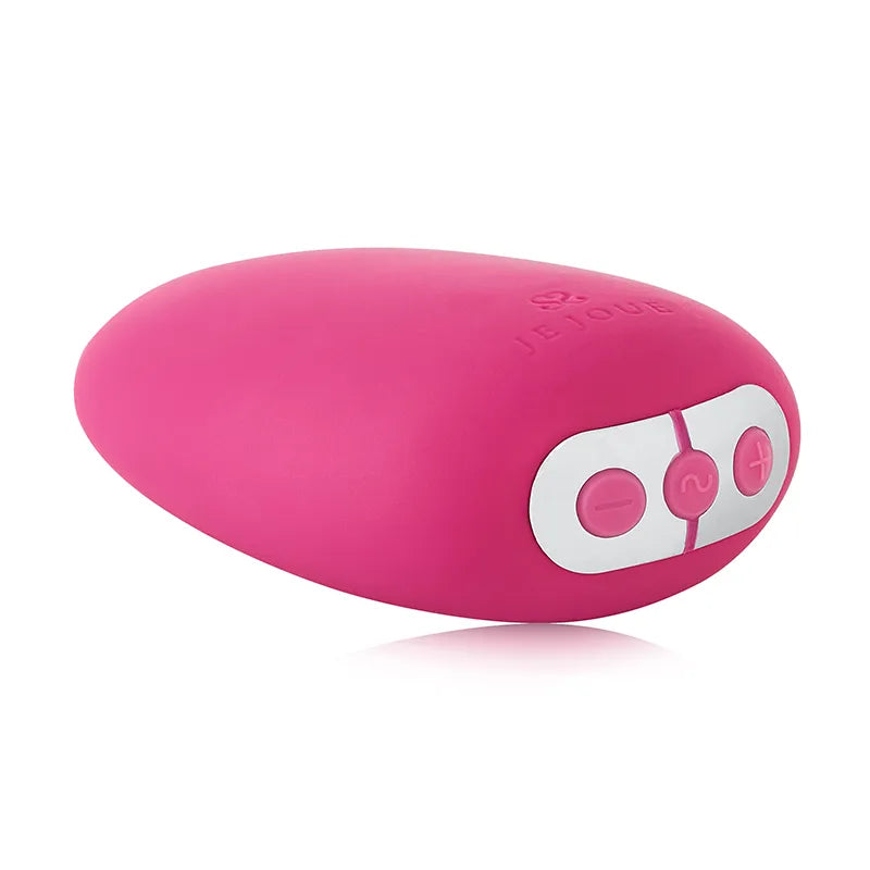 Pink electronic device with control buttons on a white background