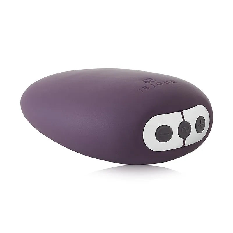Purple electronic device with control buttons on a white background