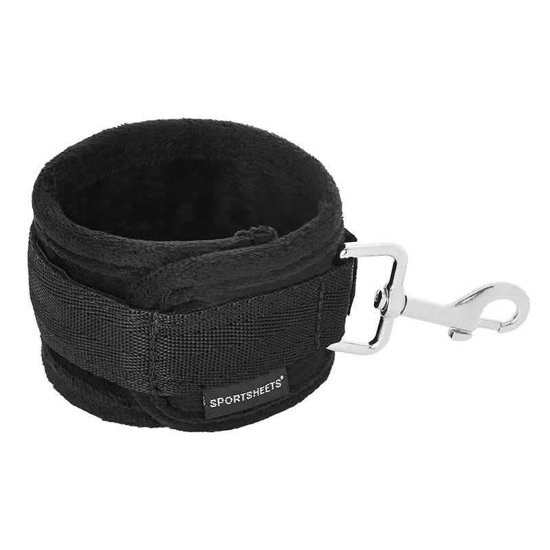Black sportsheets with a clip on a white background