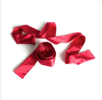 red satin ribbon restraints