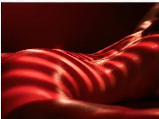 infared light on a woman's back