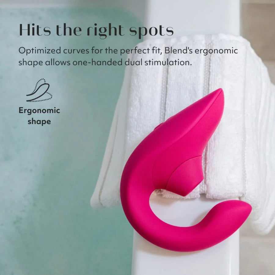 Pink curved object with text about ergonomic design on a white towel.