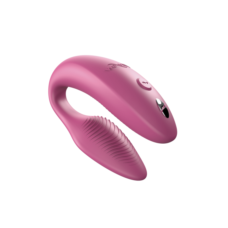 Pink silicone ring with textured design on a white background