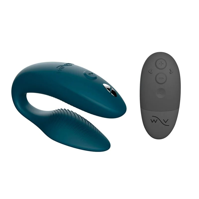 Blue and gray device with remote control on a white background